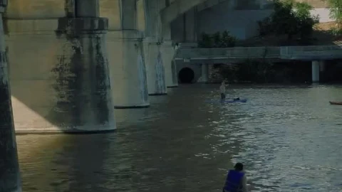 Stock Video People Rowing In A River In The City Live Wallpaper - Free Live Wallpaper