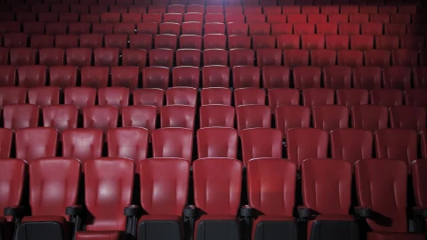 Stock Video People With Masks Sitting Apart In A Movie Theater Live Wallpaper - Free Live Wallpaper