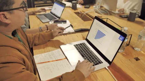 Stock Video People Working On A Wooden Table Live Wallpaper - Free Live Wallpaper