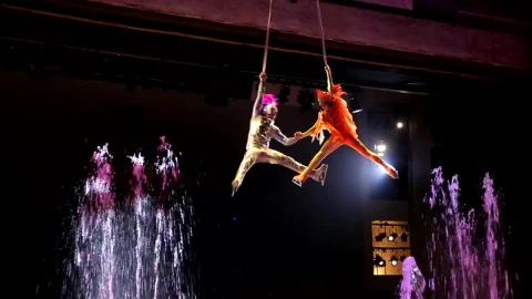 Stock Video Performer Spinning Above Bright Fountains Live Wallpaper - Free Live Wallpaper