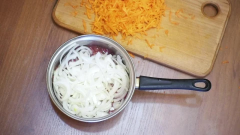 Stock Video Person Adding Grated Carrot To A Recipe Live Wallpaper - Free Live Wallpaper