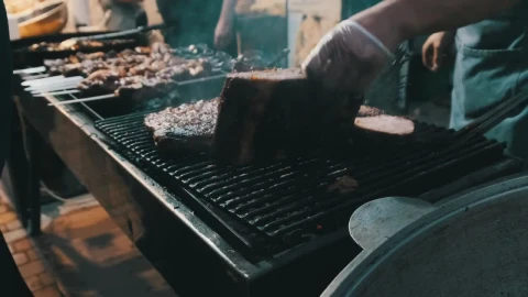 Stock Video Person Cooking Cuts Of Meat On The Grill Live Wallpaper - Free Live Wallpaper