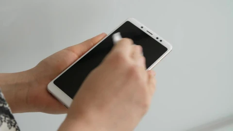 Stock Video Person Disinfecting His Cell Phone Live Wallpaper - Free Live Wallpaper