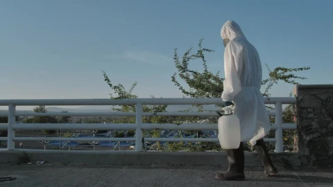 Stock Video Person Disinfecting A Bridge Live Wallpaper - Free Live Wallpaper