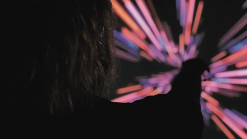 Stock Video Person In The Dark With A Colored Lights Background Live Wallpaper - Free Live Wallpaper