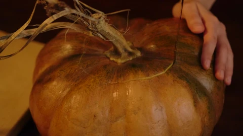 Stock Video Person Making A Hole In A Pumpkin For Halloween Live Wallpaper - Free Live Wallpaper