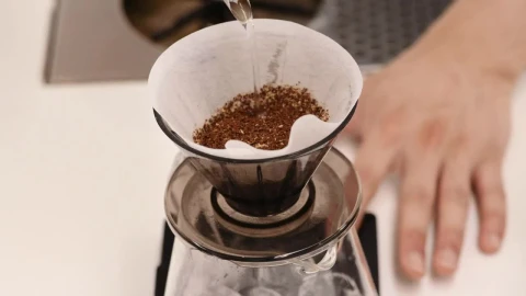 Stock Video Person Making A V Pour Over Coffee From Above Live Wallpaper - Free Live Wallpaper