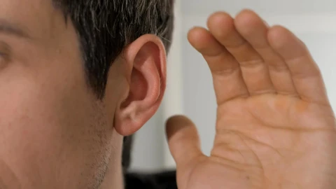 Stock Video Person Places His Hand On His Ear To Hear Better Live Wallpaper - Free Live Wallpaper
