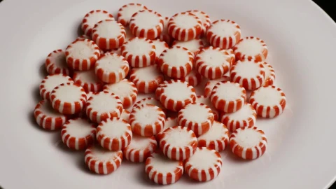 Video Stock Red Spermints On A White Plate Rotating Live Wallpaper Free - Free Live Wallpaper