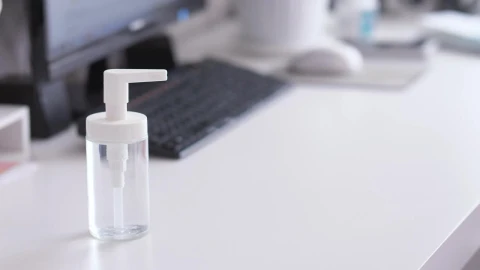 Video Stock Person Sanitizing Their Hands In The Office Live Wallpaper Free - Free Live Wallpaper