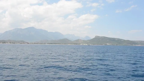 Video Stock Photographer Looking Back Towards An Island Live Wallpaper Free - Free Live Wallpaper
