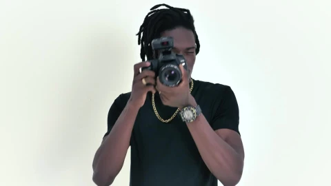 Video Stock Photographer Taking Photos Head On On A White Background Live Wallpaper Free - Free Live Wallpaper