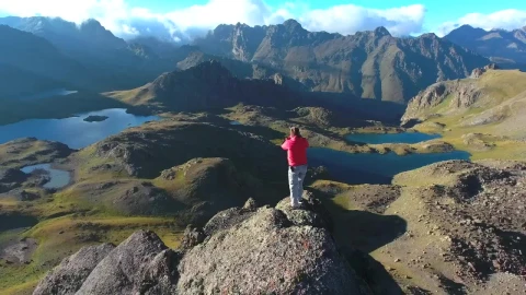 Video Stock Photographer Working At The Top Of A Mountain Peak Live Wallpaper Free - Free Live Wallpaper