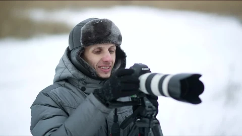 Video Stock Photographer Working On An Outdoor Winter Spot Live Wallpaper Free - Free Live Wallpaper