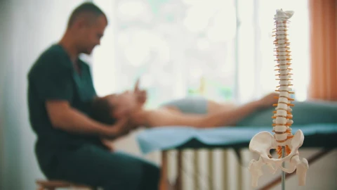 Video Stock Physiotherapist Working On A Womans Neck In Background Live Wallpaper Free - Free Live Wallpaper