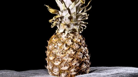 Video Stock Pineapple Rotating On A Black Background Live Wallpaper Free - Free Live Wallpaper