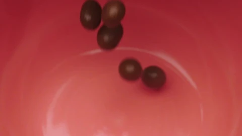 Video Stock Pink Bowl Being Filled With Many Chocolate Beans Live Wallpaper Free - Free Live Wallpaper