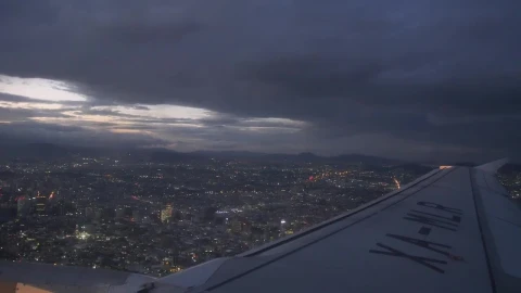 Video Stock Plane Flying Over A City At Night Live Wallpaper Free - Free Live Wallpaper