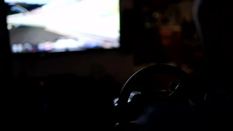 Video Stock Playing A Racing Game With A Wheel Live Wallpaper Free - Free Live Wallpaper