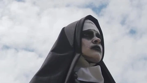 Video Stock Portrait Of A Devilish Nun Smiling Live Wallpaper Free - Free Live Wallpaper