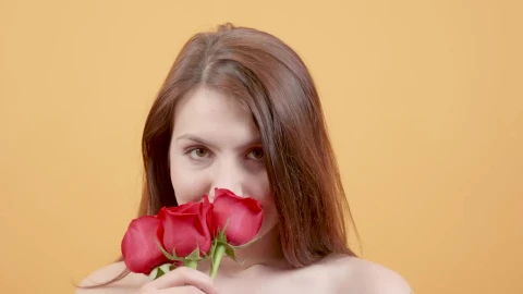 Video Stock Portrait Of Young Woman Smelling Red Roses Live Wallpaper Free - Free Live Wallpaper