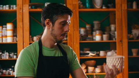 Video Stock Pottery Master Examining A Clay Pot Live Wallpaper Free - Free Live Wallpaper