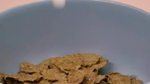Video Stock Pouring Milk Into A Bowl With Healthy Cereal Live Wallpaper Free - Free Live Wallpaper