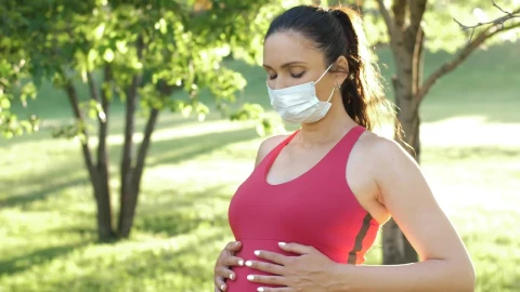 Video Stock Pregnant Woman Wearing Sportswear And Mask Live Wallpaper Free - Free Live Wallpaper