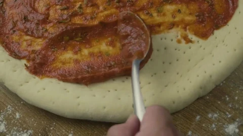 Video Stock Preparing A Pizza Dough Covering It With Salsa Live Wallpaper Free - Free Live Wallpaper
