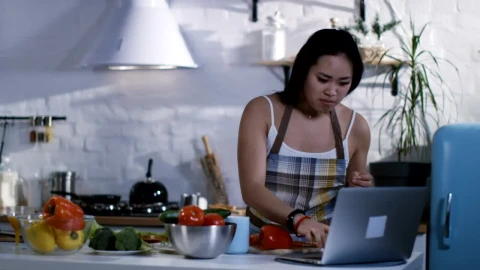 Video Stock Preparing Food Following A Tutorial In The Kitchen Live Wallpaper Free - Free Live Wallpaper