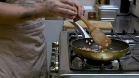 Video Stock Professional Cook Frying Bacon In A Frying Pan Live Wallpaper Free - Free Live Wallpaper