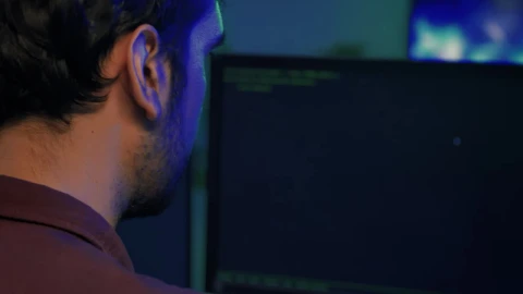 Video Stock Professional Programmer Working On A Large Computer  LargeLive Wallpaper Free - Free Live Wallpaper