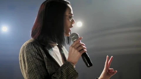 Video Stock Professional Speaker With A Microphone In Hand Live Wallpaper Free - Free Live Wallpaper