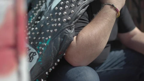 Video Stock Punk Man Holding A Black Leather Jacket Live Wallpaper Free - Free Live Wallpaper