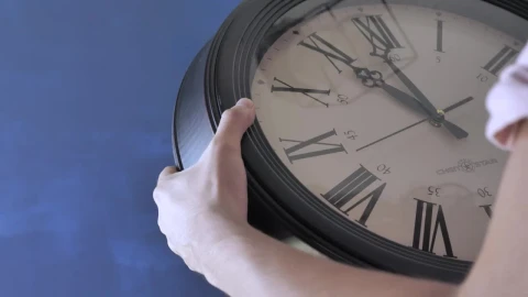 Video Stock Putting On A Wall Clock Live Wallpaper Free - Free Live Wallpaper