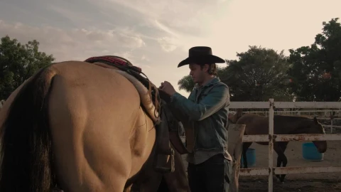 Video Stock Rancher Man Tying A Saddle Chair To A Horse Live Wallpaper Free - Free Live Wallpaper