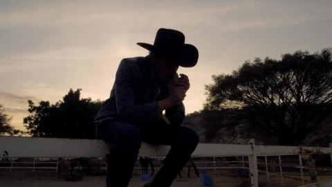 Video Stock Rancher Smoking At Sunset Live Wallpaper Free - Free Live Wallpaper