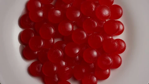 Video Stock Red Candies Slowly Spinning On A Plate Live Wallpaper Free - Free Live Wallpaper