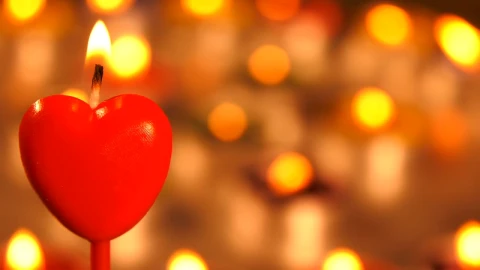 Video Stock Red Heart Shaped Candle With More Candles Behind Live Wallpaper Free - Free Live Wallpaper