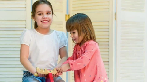 Free Stock Video Sisters Playing With A Rocking Horse Live Wallpaper - Free Live Wallpaper