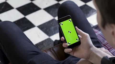Free Stock Video Sitting Down With A Smartphone Live Wallpaper - Free Live Wallpaper