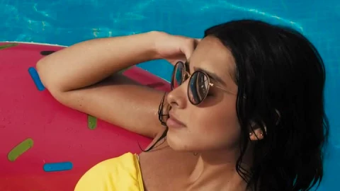 Free Stock Video Sitting In An Inflatable Donut In A Pool Live Wallpaper - Free Live Wallpaper