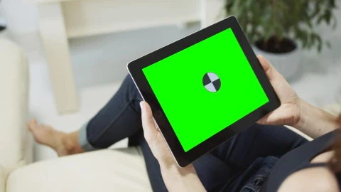 Free Stock Video Sitting On Sofa Browsing Web On Chroma Key Tablet Live Wallpaper - Free Live Wallpaper