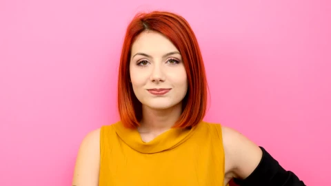 Free Stock Video Redhead Woman Smiling With Pink Background Live Wallpaper - Free Live Wallpaper