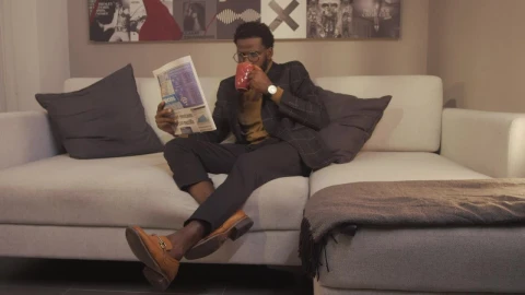 Free Stock Video Relaxed Guy Drinking Coffee While He Reads The News Live Wallpaper - Free Live Wallpaper
