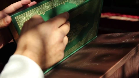 Free Stock Video Religious Man Looking At The Pages Of The Quran Live Wallpaper - Free Live Wallpaper