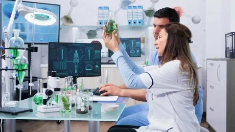 Free Stock Video Researcher Holding A Vial Live Wallpaper - Free Live Wallpaper
