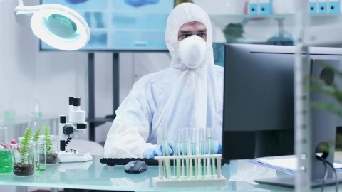 Free Stock Video Researcher In Full Protective Clothing Live Wallpaper - Free Live Wallpaper