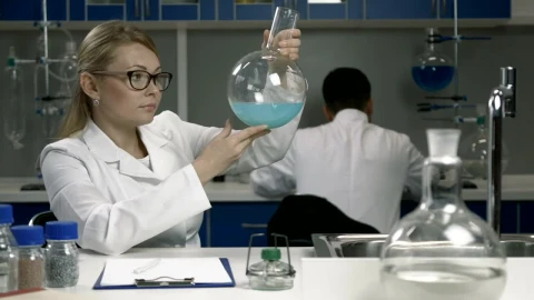 Free Stock Video Researcher Working In A Lab Live Wallpaper - Free Live Wallpaper