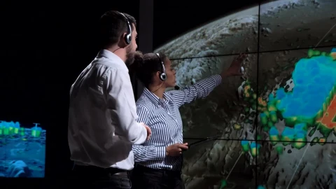 Free Stock Video Researchers Looking At The Weather In The Screen Live Wallpaper - Free Live Wallpaper